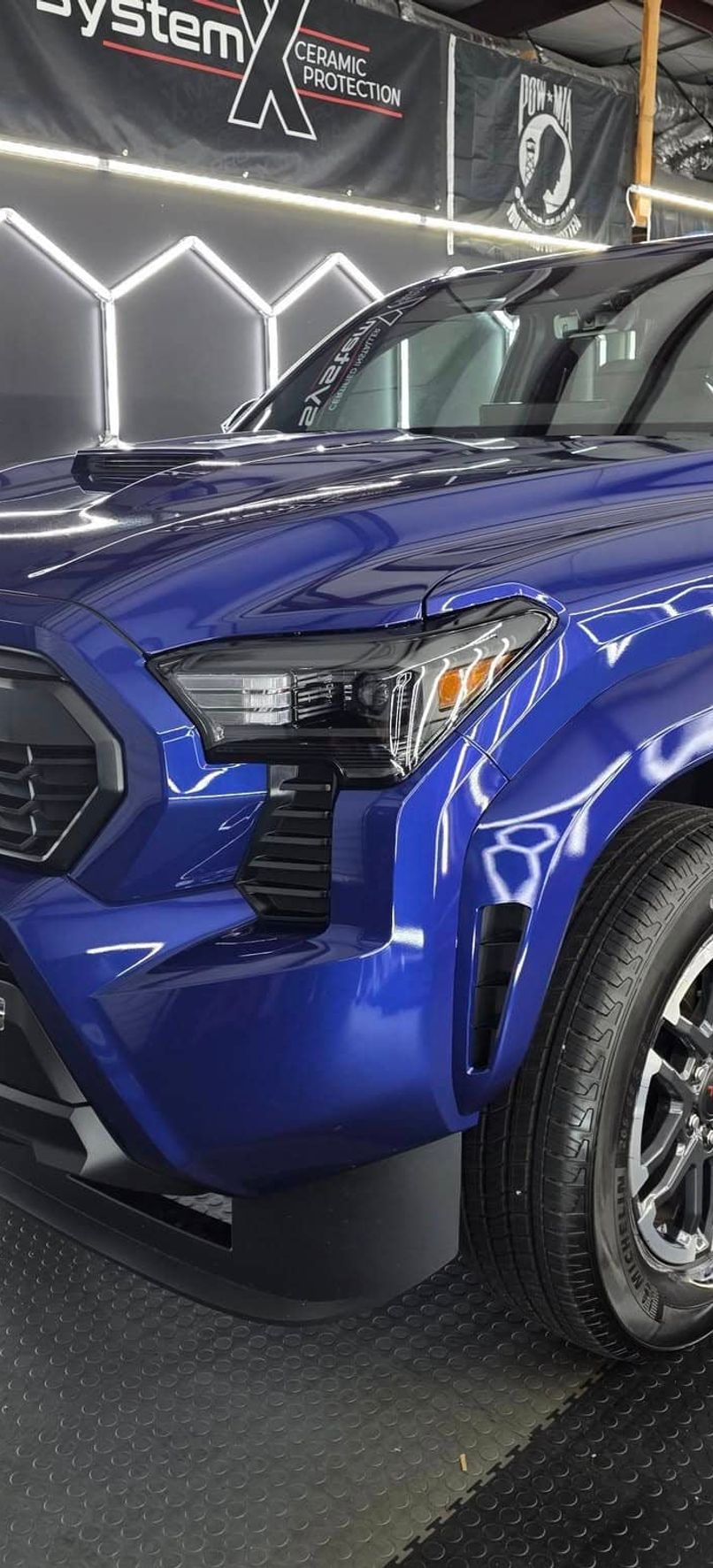 Porsche parked infront of a house